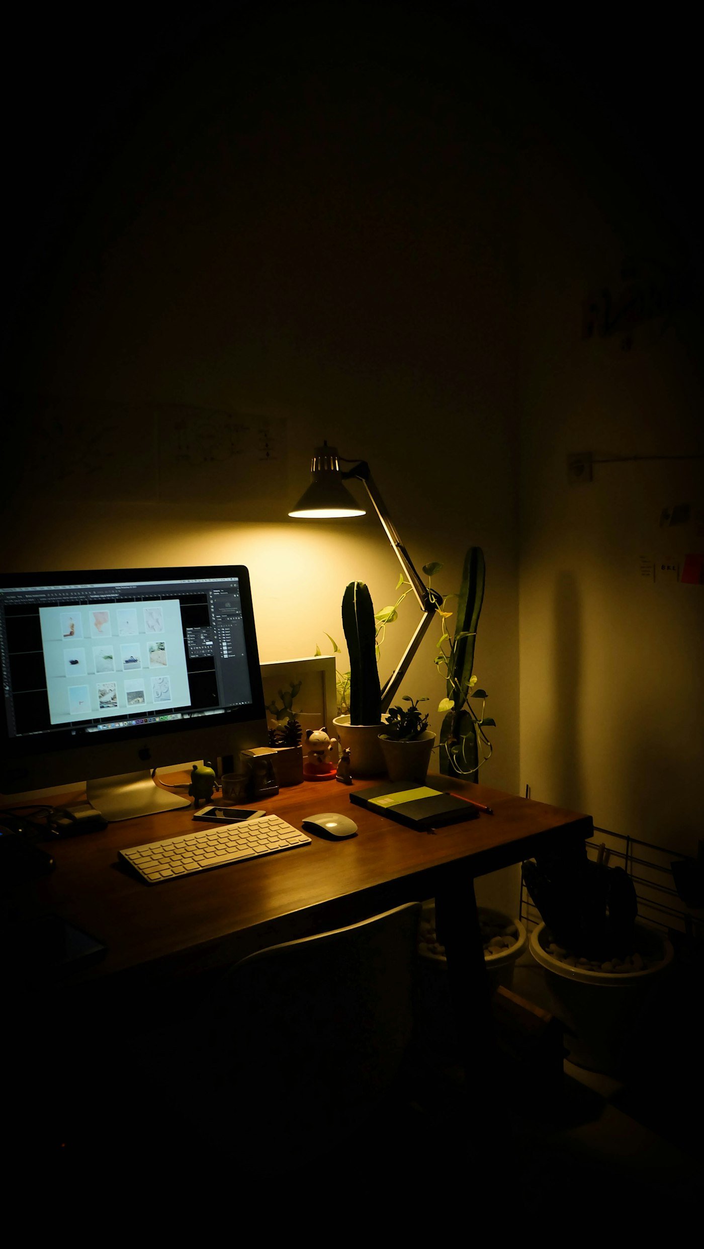 Computer monitor on a wooden desk (placeholder for a team photo)