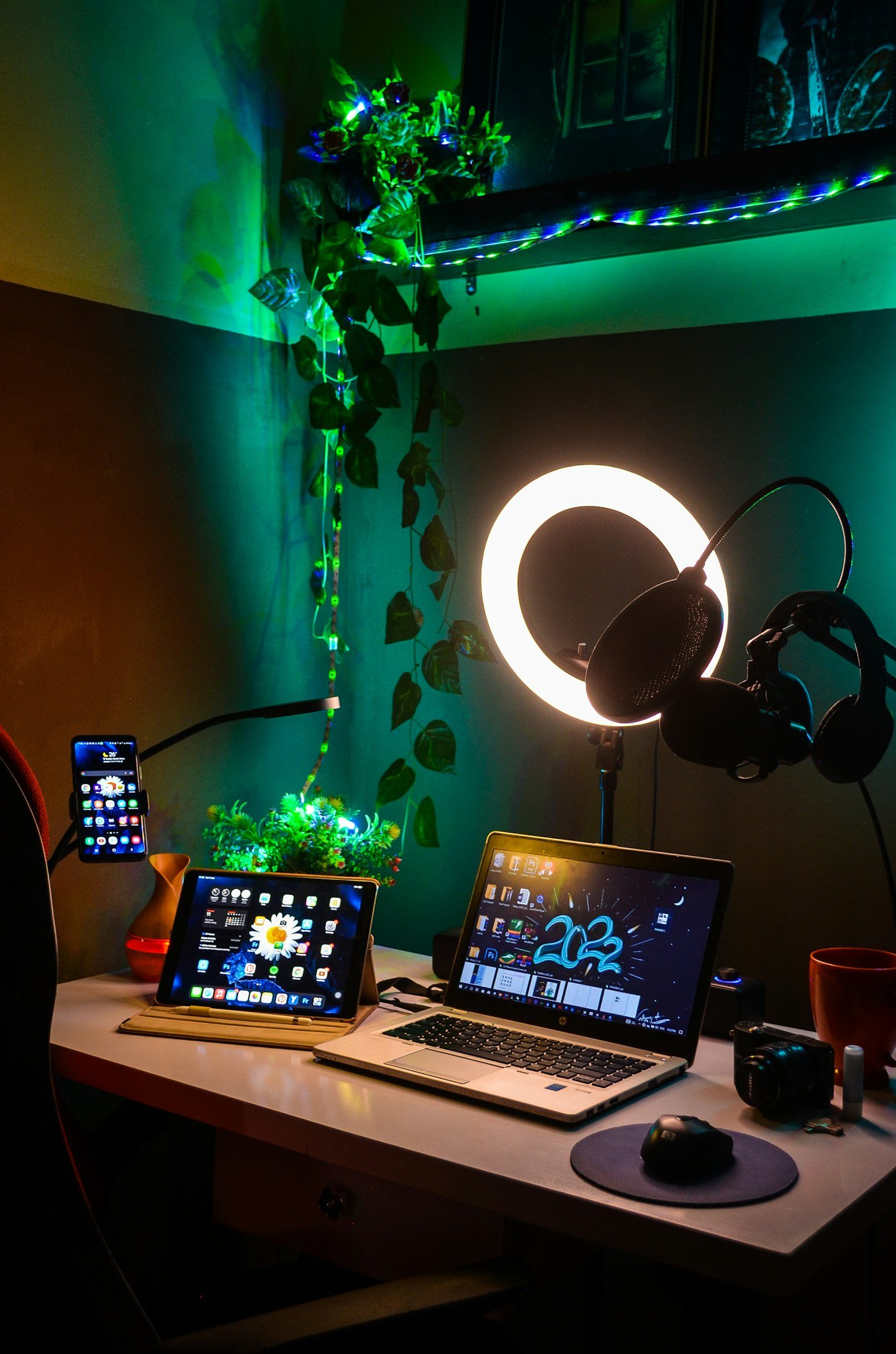 Laptop on a wooden desk (placeholder for a team photo)